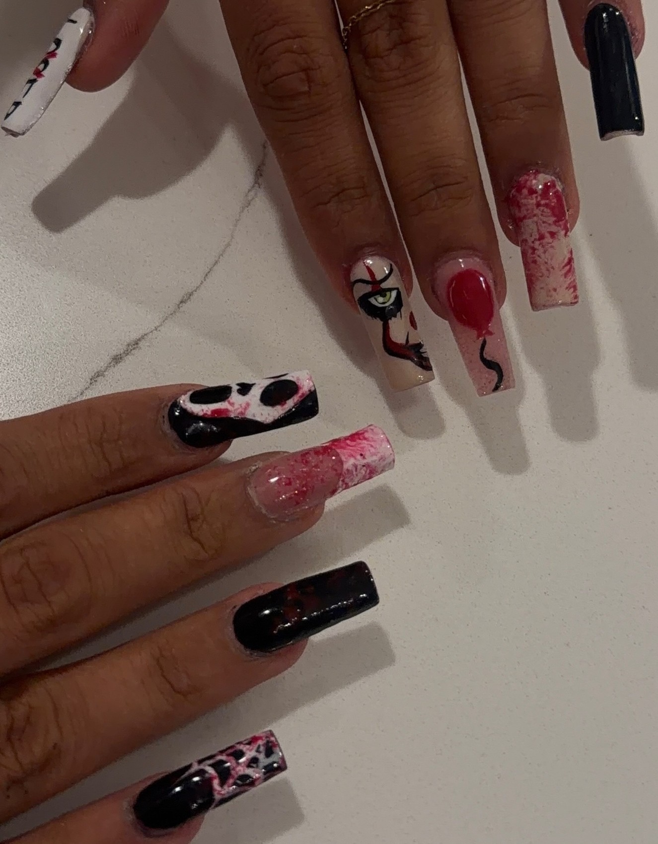 Cherry and black-and-white acrylic nail art by Eiman